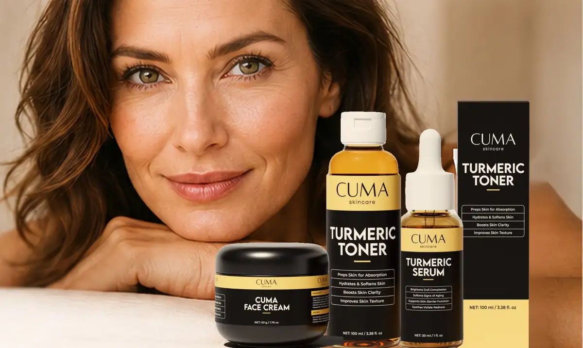 A smiling woman resting her chin on her hands beside CUMA turmeric skincare